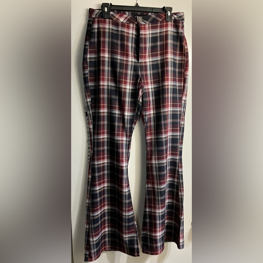 Brand new- juniors sized 9 multi-colored bell bottom 90’s pants by Almost Famous